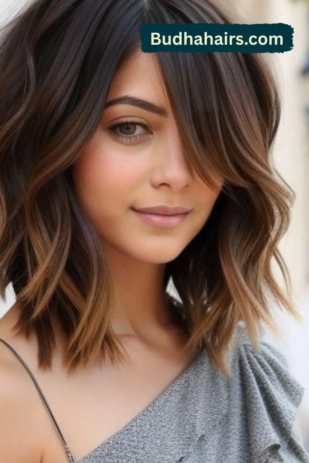 Sleek Side-Swept Bob with Defined Eye-Covering Bangs