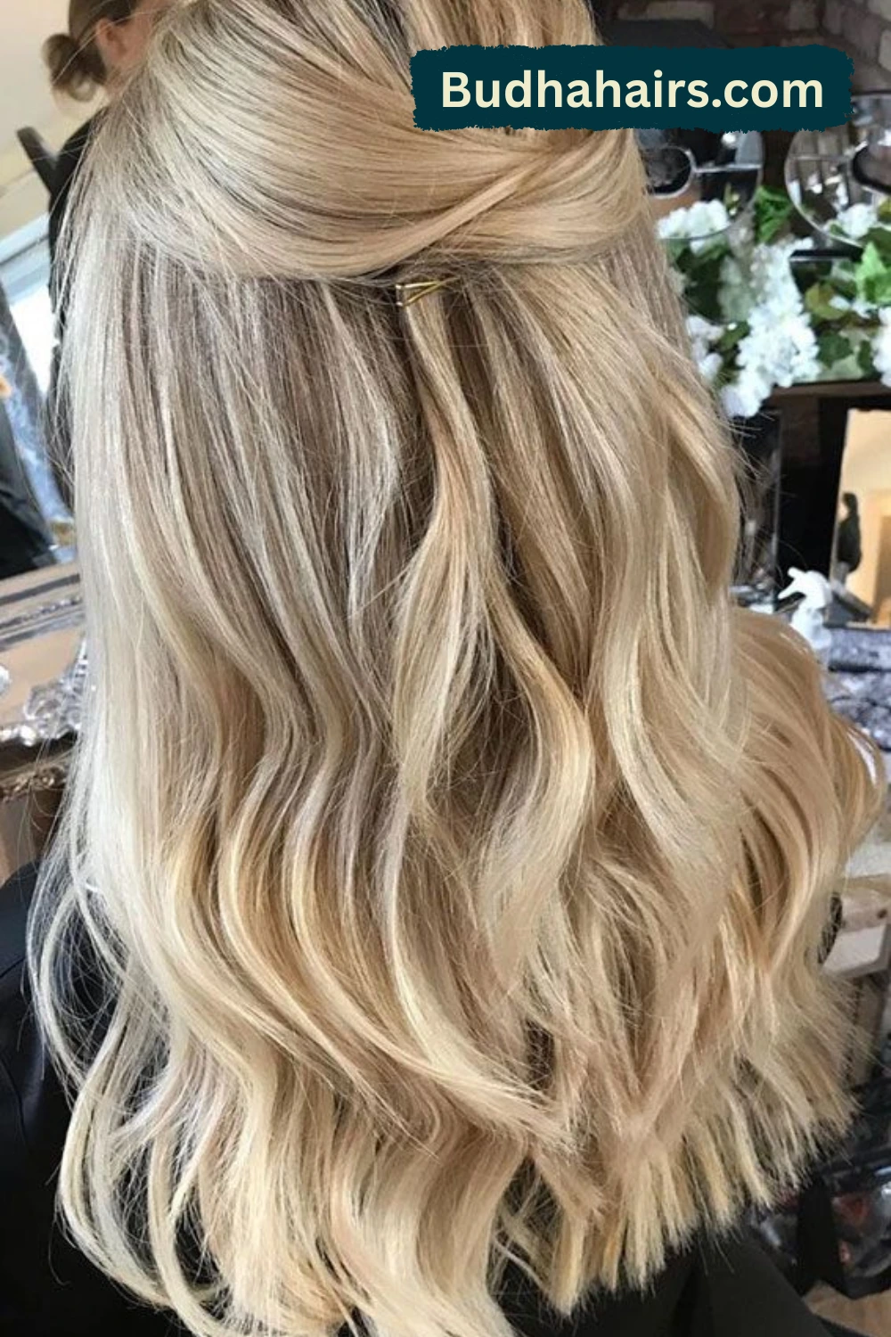 Voluminous Half-Up Blonde Updo with Bangs